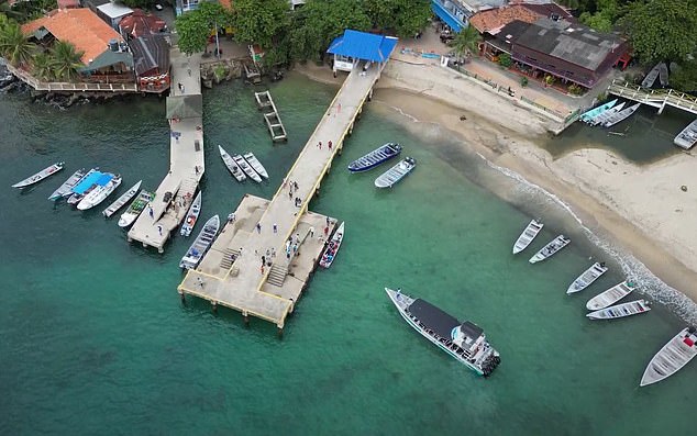 Capurganá (above) is one of the last major stops before these travelers enter Central America in search of a new life further north, invariably in the US.