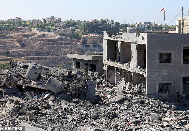 A view shows damage at the site of the Israeli attack in Saksakiyeh, southern Lebanon, on September 27, 2024.