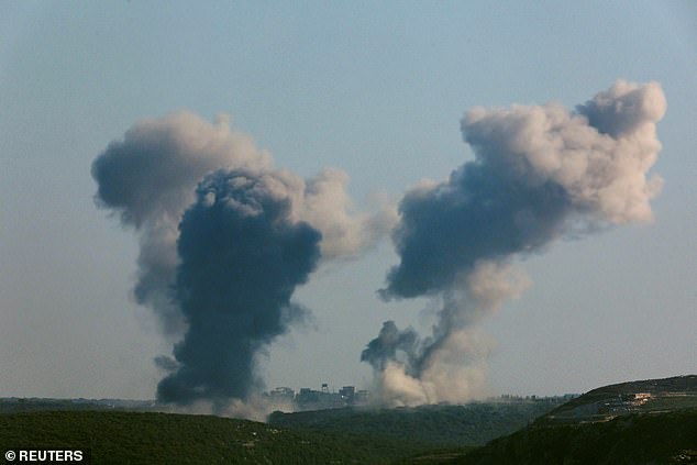 Smoke rises over southern Lebanon following an Israeli attack, amid ongoing cross-border hostilities between Hezbollah and Israeli forces, as seen from Tyre, Lebanon, on September 27, 2024.