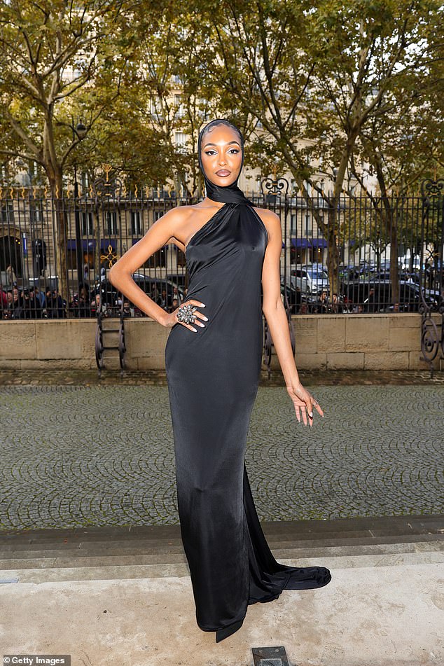 While model Jourdan Dunn turned heads in an elegant hooded dress that perfectly hugged her figure.