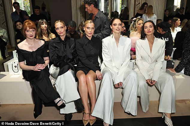 The group of fashionistas were in high spirits as they mingled and posed together backstage before taking their seats in the star-studded front row (left to right Nicola Roberts, Lady Eliza Spencer, Lady Amelia Spencer, Coco Rocha and Amy Jackson).