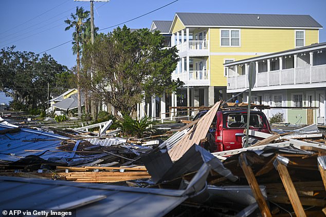 Debris left behind by Hurricane Helene after making landfall is seen in Cedar Key, Florida