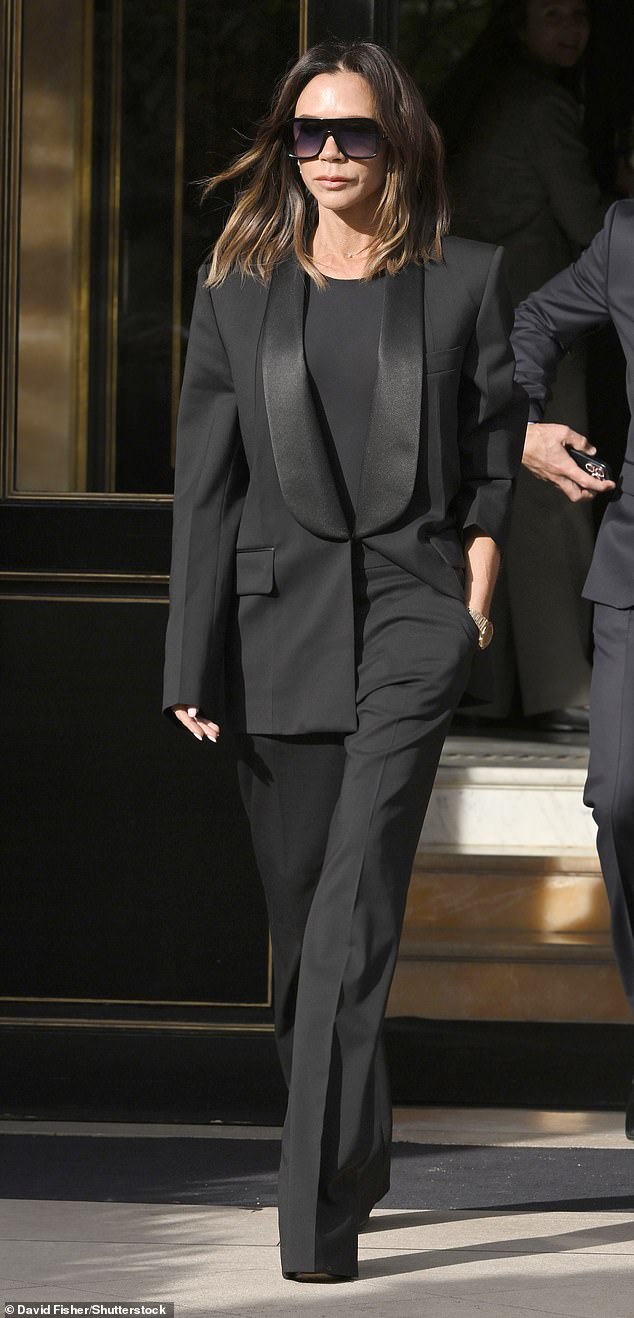 Not to be left out, the designer herself wore a striking black powersuit with satin lapels from her new collection, combined with wide-leg pants.