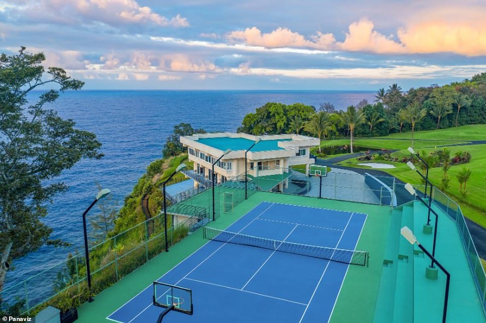 This idyllic paradise also features a nine-tee golf course, an Olympic-size swimming pool with a two-story water slide, and a massive tennis court in a 450-seat stadium.