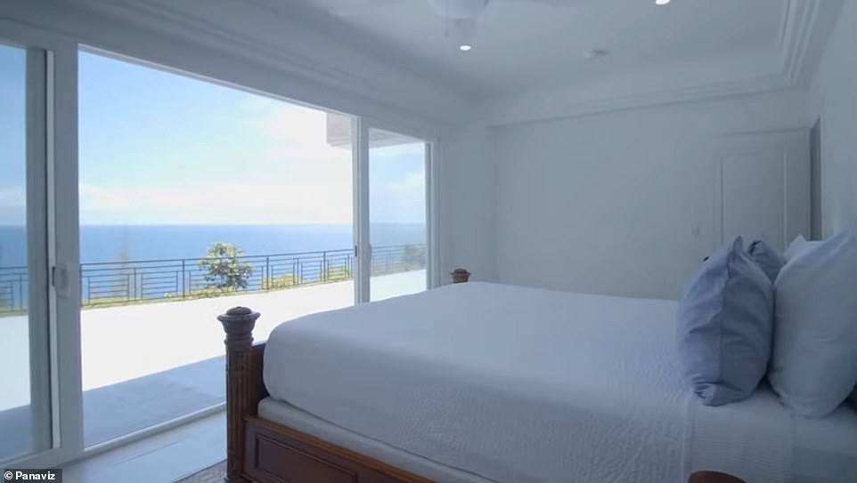 One of the suites walks out onto the patio with a stunning view of the ocean.