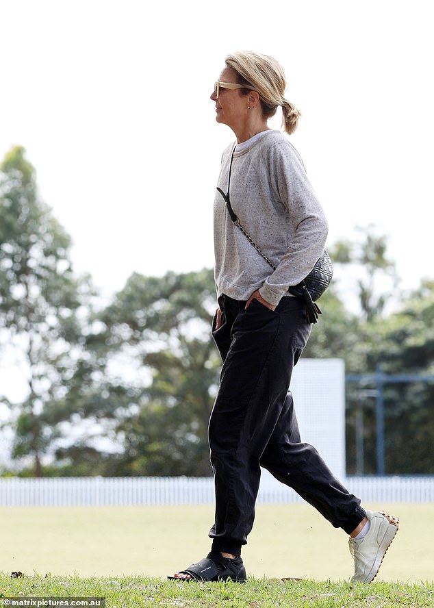 The Perth-born journalist wore her blonde hair up in a ponytail and highlighted her natural beauty by not wearing makeup for the outing.