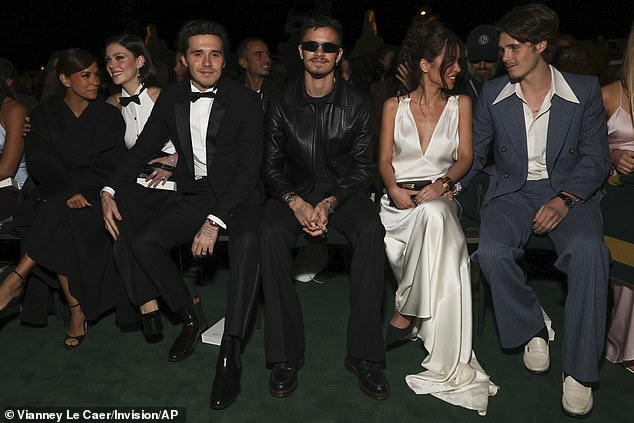 Victoria's children seemed very happy as they sat in the front row of their show.