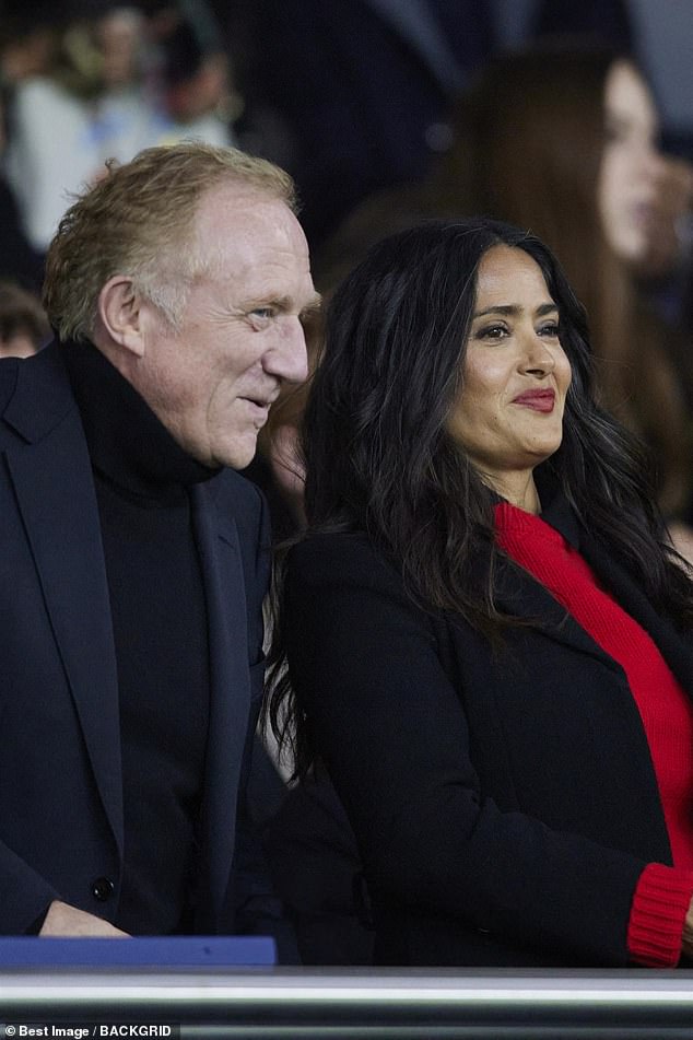 Salma's husband, François-Henri, CEO of Kering, looked dapper for the match in a black turtleneck and vest.