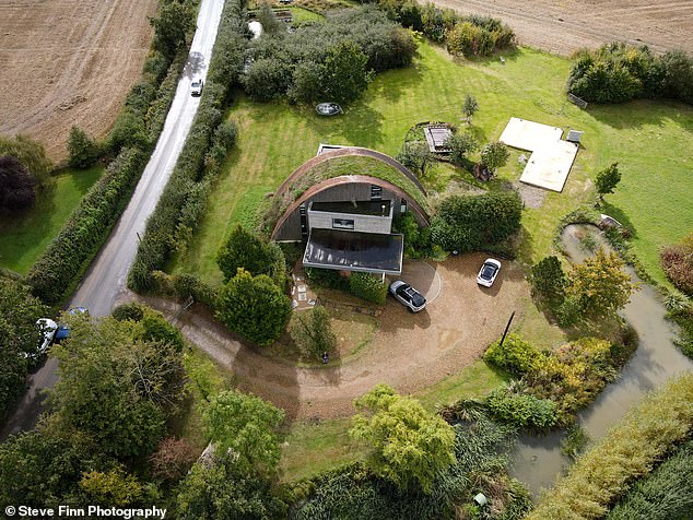 The couple grew several trees outside the property, built outbuildings and purchased more land for more privacy.