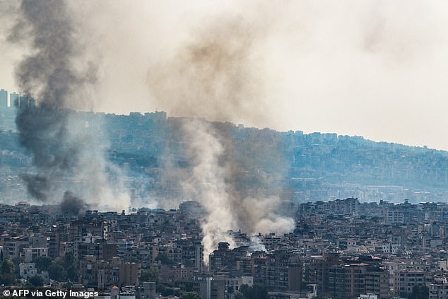 Smoke rises over the southern suburbs of Beirut during Israeli attacks on September 28, 2024. Lebanon's Iran-backed Hezbollah group confirmed on September 28 that its leader Hassan Nasrallah had been killed, after Israel said that there was "removed" him in an attack in southern Beirut a day earlier