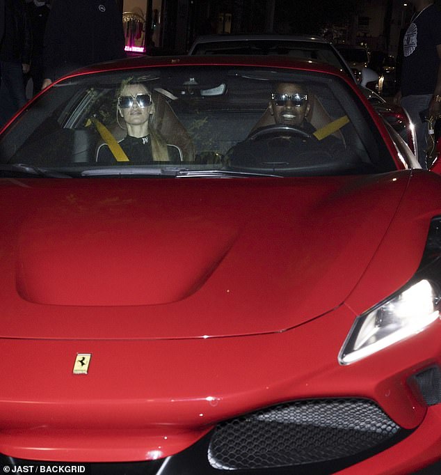 After enjoying a romantic dinner together, they were seen getting into Foxx's flashy red Ferrari F8 and driving away.