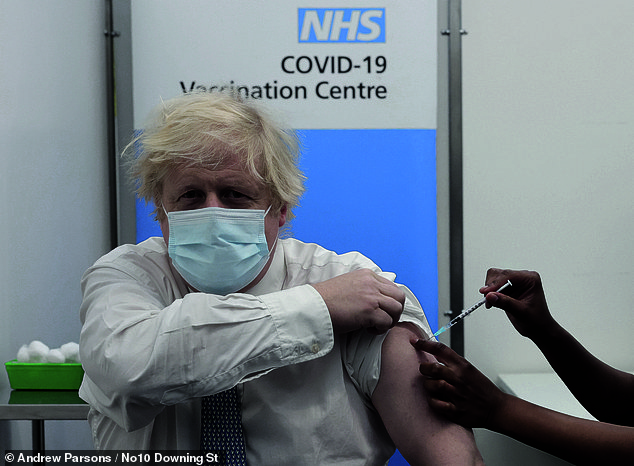 Johnson receives his Covid vaccine at St Thomas' Hospital in London in December 2021