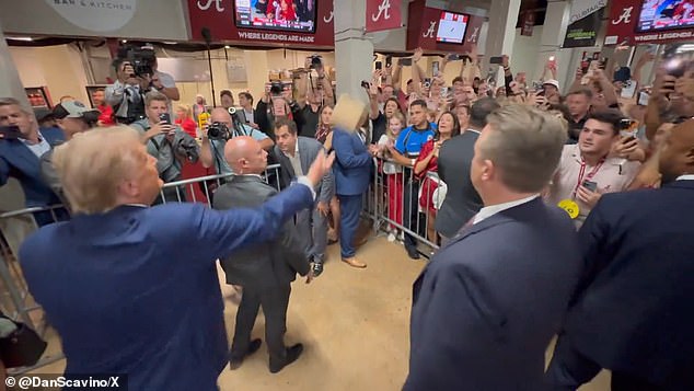 The former president's Secret Service was very close, watching every movement of the crowd.