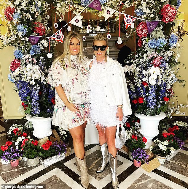 = New bride Billi swapped her flowy wedding dress for a white feather minidress and silver cowboy boots as she let her hair down for the second day of her wedding festivities (pictured with sister Giorgia)