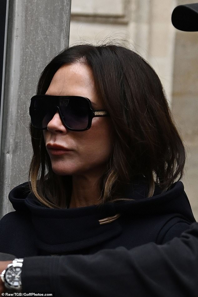 Earlier in the day, Posh kept a low profile in a black jacket and trendy sunglasses.