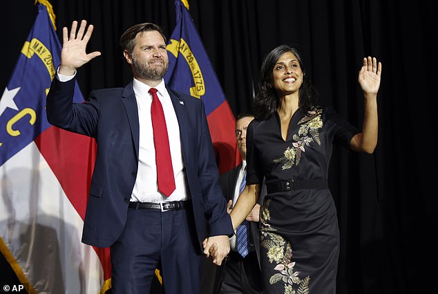 Sen. Vance, R-Ohio, the Republican vice presidential candidate, takes the stage with his wife Usha Vance at a campaign event in Charlotte, North Carolina, Monday, Sept. 23, 2024.