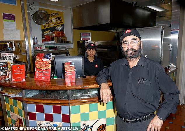 Franchise owner Santnam Ahuia (pictured), who took over the pizzeria with his wife Jenny in 2006, told Daily Mail Australia he wanted to keep the retro relic as it was in its heyday.