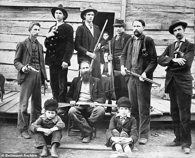 A group photo of the Hatfields circa 1899 in front of their home in West Virginia.