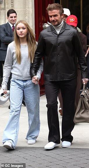 Jackie has been seen numerous times with the Beckhams during Fashion Week (David and Harper, 13, pictured).