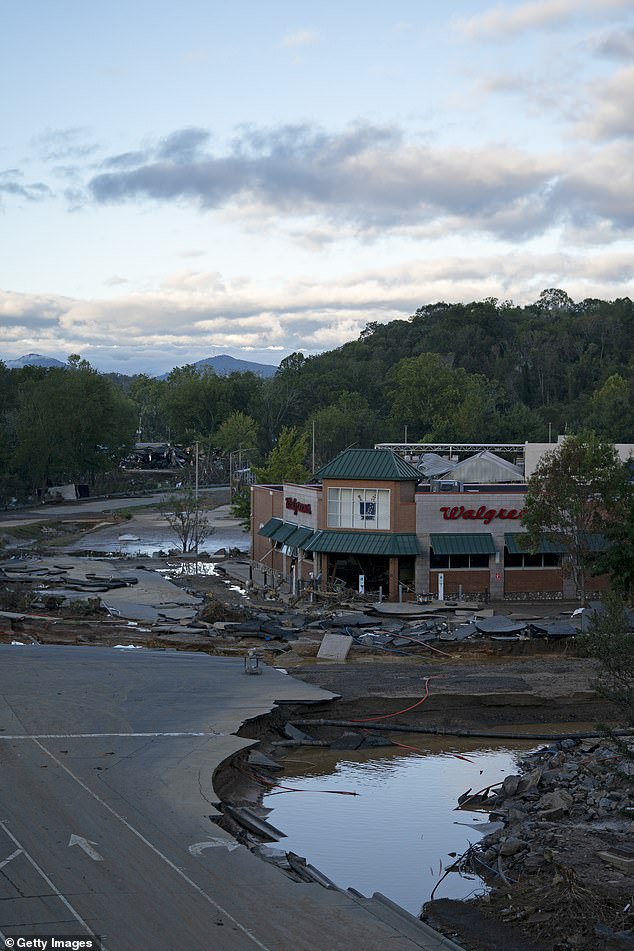 A road is seen damaged by flooding after Hurricane Helene