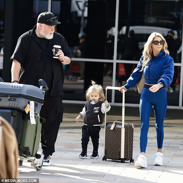 Radio royalty touched down in Sydney over the weekend with Kyle, 53, touching down on Saturday alongside wife Tegan (née Kynaston), 38, (right) and son Otto, two ( center).