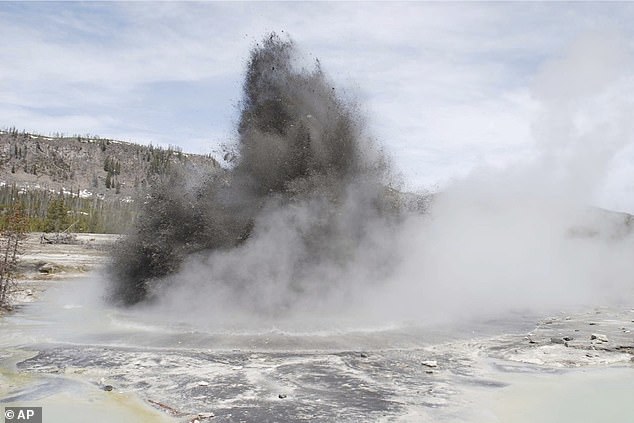 Pictured: A hydrothermal event is seen in Biscuit Basin in Yellowstone National Park in 2009. Yellowstone officials say a similar explosion on Tuesday, July 23, 2024 sent tourists running for cover and destroyed a boardwalk.