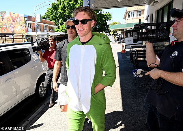 Young gun Jaspa Fletcher was all smiles as he arrived in a frog jumpsuit