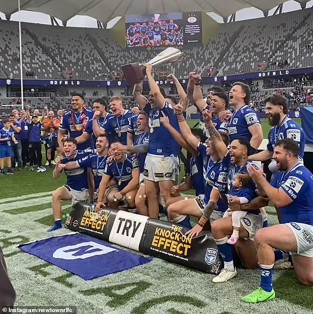 Barry had been watching the Newtown Jets win the NSW Cup just hours before he died (pictured, the Jets celebrating their victory on Sunday).