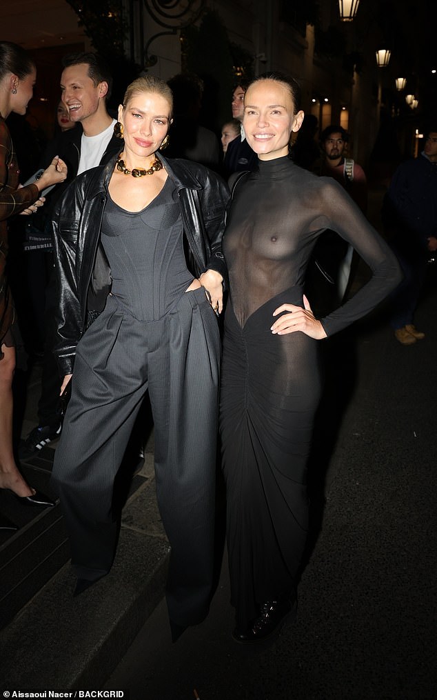 On the other hand, Natasha Poly (R) dared to strip naked while going braless under a transparent black dress when arriving at the party.