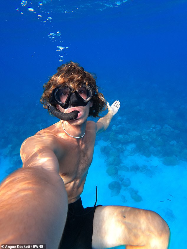 Angus takes a selfie while swimming around Mangareva in French Polynesia before the attack occurred.