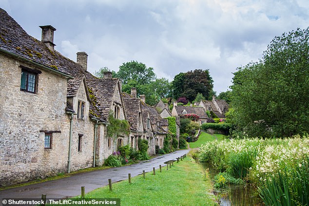 The famous Arlington Row of quaint cottages in Bibury, probably the most photographed place in the Cotswolds