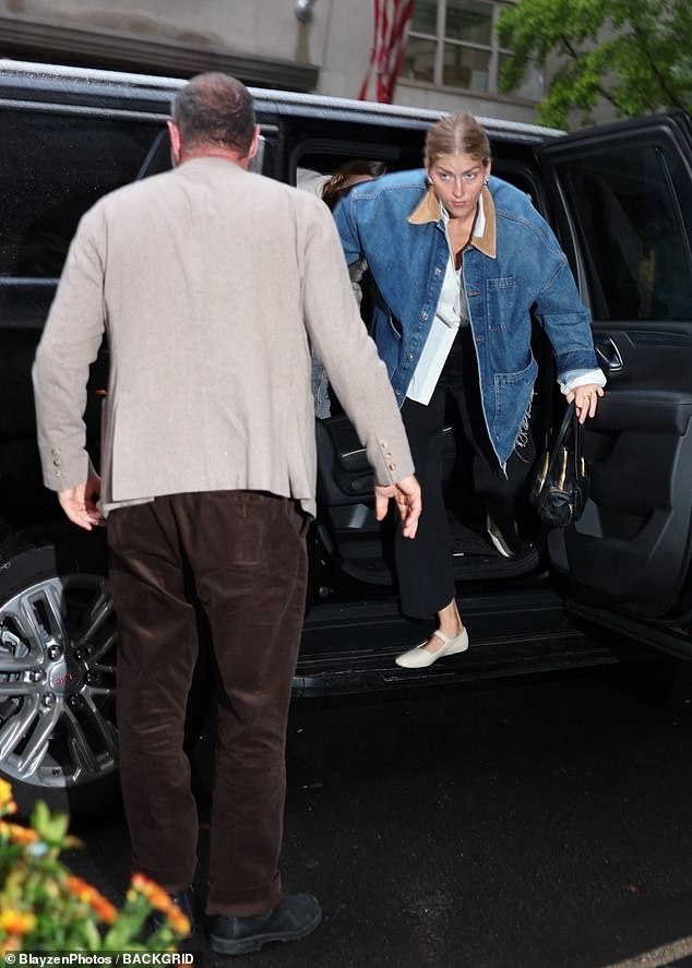 His wife of one year, Taylor, 32, sported a coat and jeans as she entered the exclusive restaurant.