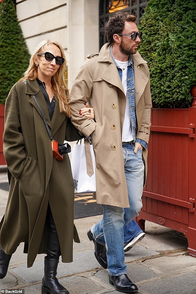 Sam looks dapper in a khaki green coat and black boots, while Aaron wore double denim under his stylish trench coat.