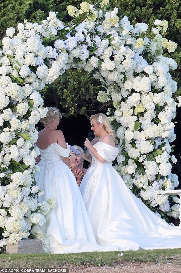 Photos from the big day showed the newlyweds looking incredible in almost identical strapless wedding dresses and voluminous skirts.