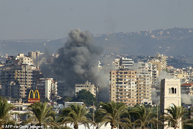 Smoke rises after an Israeli attack on villages near the southern Lebanese city of Tire on September 29, 2024.