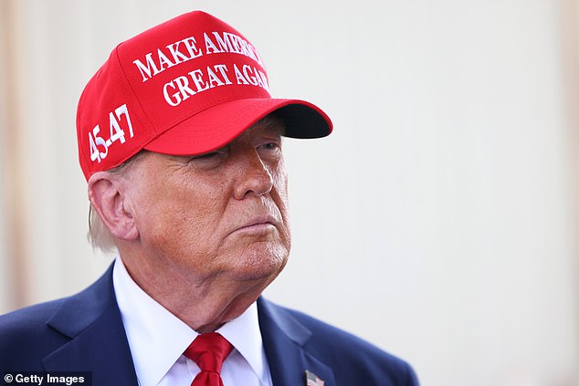 Republican presidential candidate former U.S. President Donald Trump gives brief remarks as he arrives at Valdosta Regional Airport to visit areas affected by Hurricane Helene on September 30, 2024 in Valdosta, Georgia.