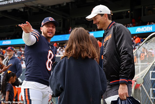 The couple certainly seemed happy at the game, posing on the sidelines and later chatting with Bears players like kicker Cairo Santos.