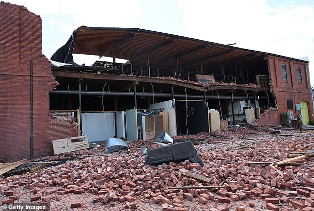 Chez What Furniture store is seen after sustaining damage during Hurricane Helene