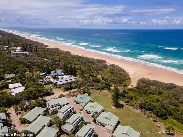 The land lot is a short walk to 75 Mile Beach.