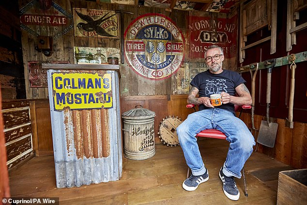 Wayne, 50, from Crewe in Cheshire, decorated the inside of his shed with vintage posters and hand-painted murals.