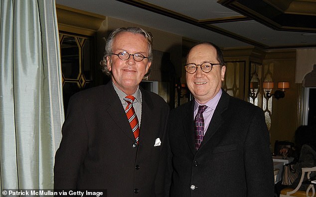 Murder victim Kenneth Savinski (left) is seen with a friend at an event at Bergdorf Goodman's restaurant "WHITE" in 2006. Savinski was an antique dealer and decorator.