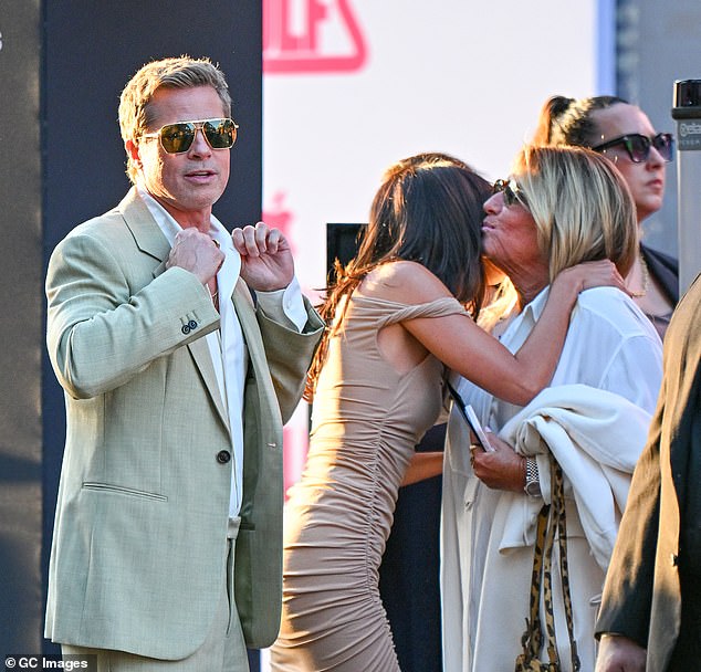 Pitt and Ramon with their manager Cynthia Pett-Dante outside the premiere of Wolfs on September 18 in Los Angeles