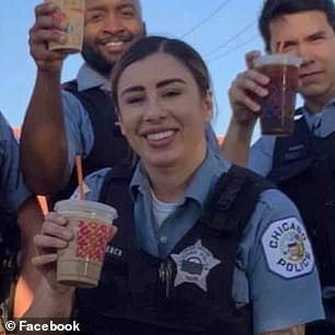 French is pictured before her death with her fellow officers.