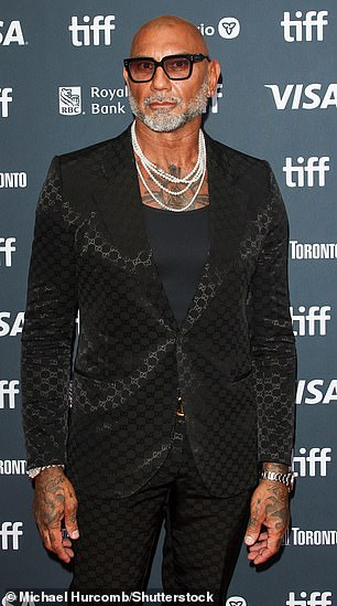 He's famous for his burly, muscular physique, but Bautista recently shocked fans after slimming down for his new role (pictured at the Toronto Film Festival on Sept. 6).