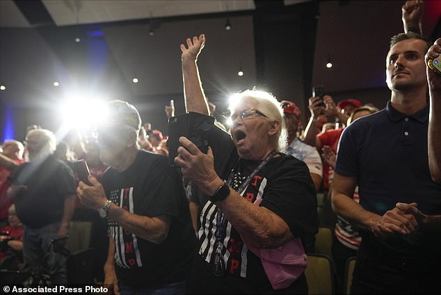 Supporters applaud as former President Donald Trump, the Republican presidential candidate, speaks at a campaign event Saturday in Prairie du Chien, Wisconsin.