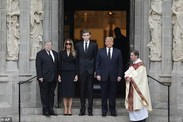 Former President Donald Trump, second right, his wife Melania, second left, their son Barron, center, and father-in-law Viktor Knavs, left, stand in front of the Church of Bethesda-by-the-Sea at the start of the funeral for Amalija Knavs, the former first lady's mother, in Palm Beach, Fla., Thursday, Jan. 18, 2024.