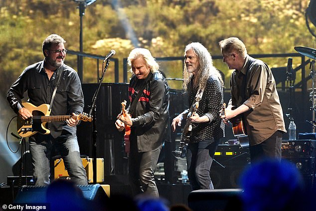 The iconic band released a heartfelt statement reflecting on the loss of their longtime friend (pictured, Vince Gill, Joe Walsh, Timothy B. Schmit and Don Henley in 2018).