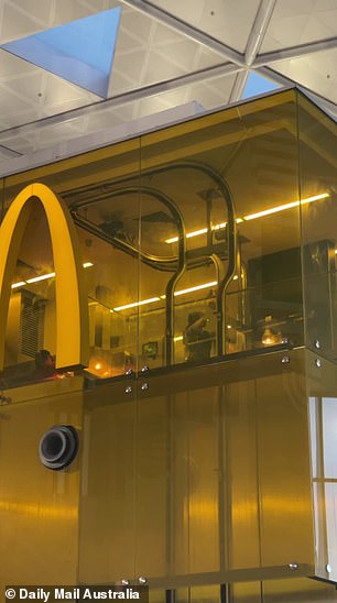 Meals at this 'unique' location are prepared in a hidden room behind yellow glass where customers can watch their orders being made in real time.