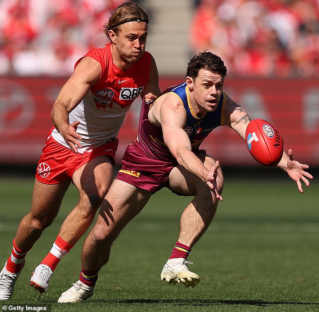 Brisbane midfielder Lachie Neale chases down a loose ball at the start of the first quarter of the AFL Grand Final (pictured)