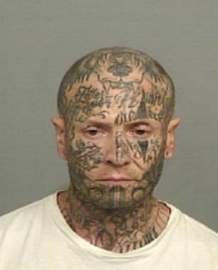 Police said the heavily tattooed former biker partner is known to frequent the Wollongong area.